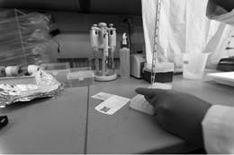 Research being done with test tubes.