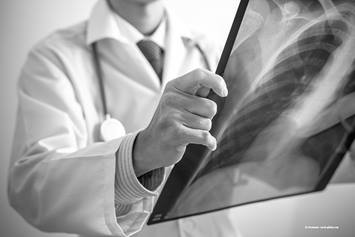 Doctor examining x-ray