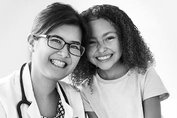 Doctor and patient smiling