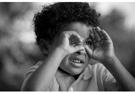 Young Boy Cupping Hand